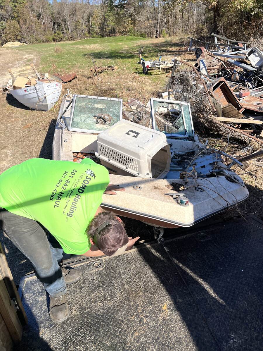 SOMD Hauling crew clearing scrap and debris during a property clean-out