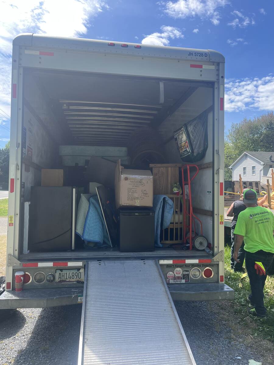 SOMD Hauling truck fully loaded with furniture and boxes from a move
